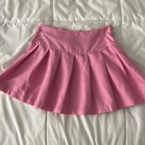 Pink pleated mini skirt